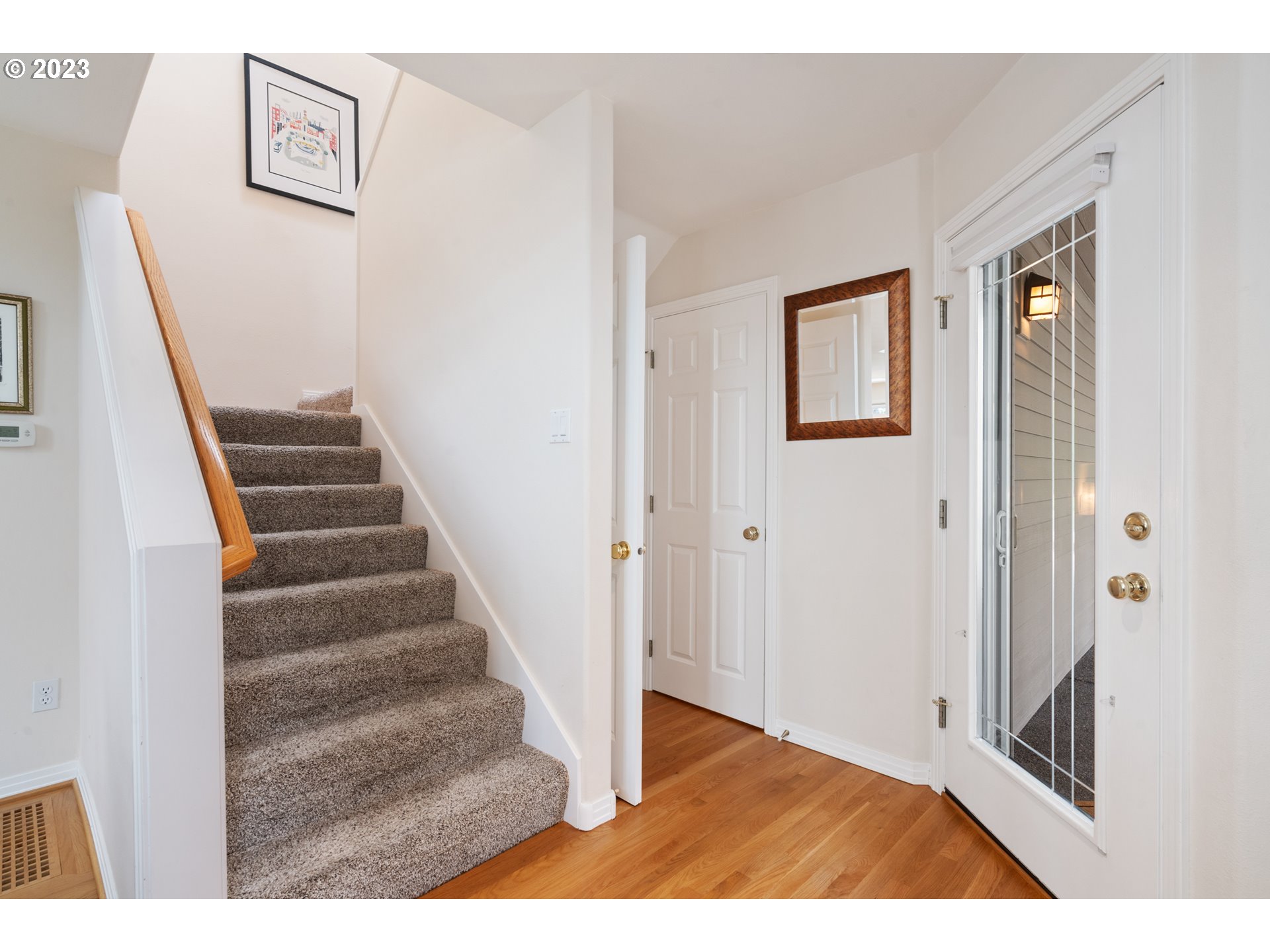 3490 Chaparrel Loop West Linn, OR 97068 - Photo 3 of 35 a view of a hallway with wooden floor and entryway