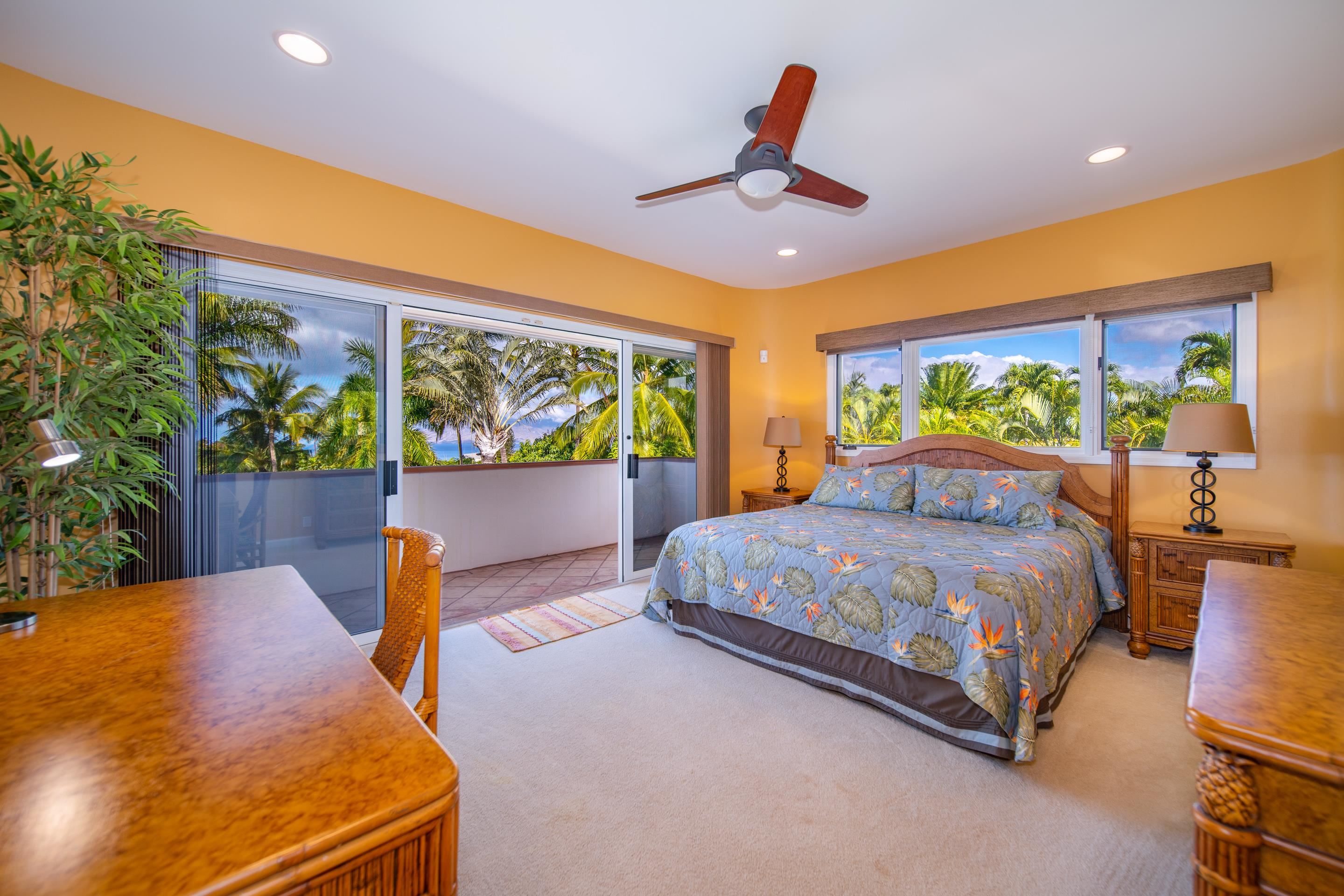 135 Kaimanu Place Kihei, HI 96753 - Photo 20 of 29 a bed room with a bed and a large window