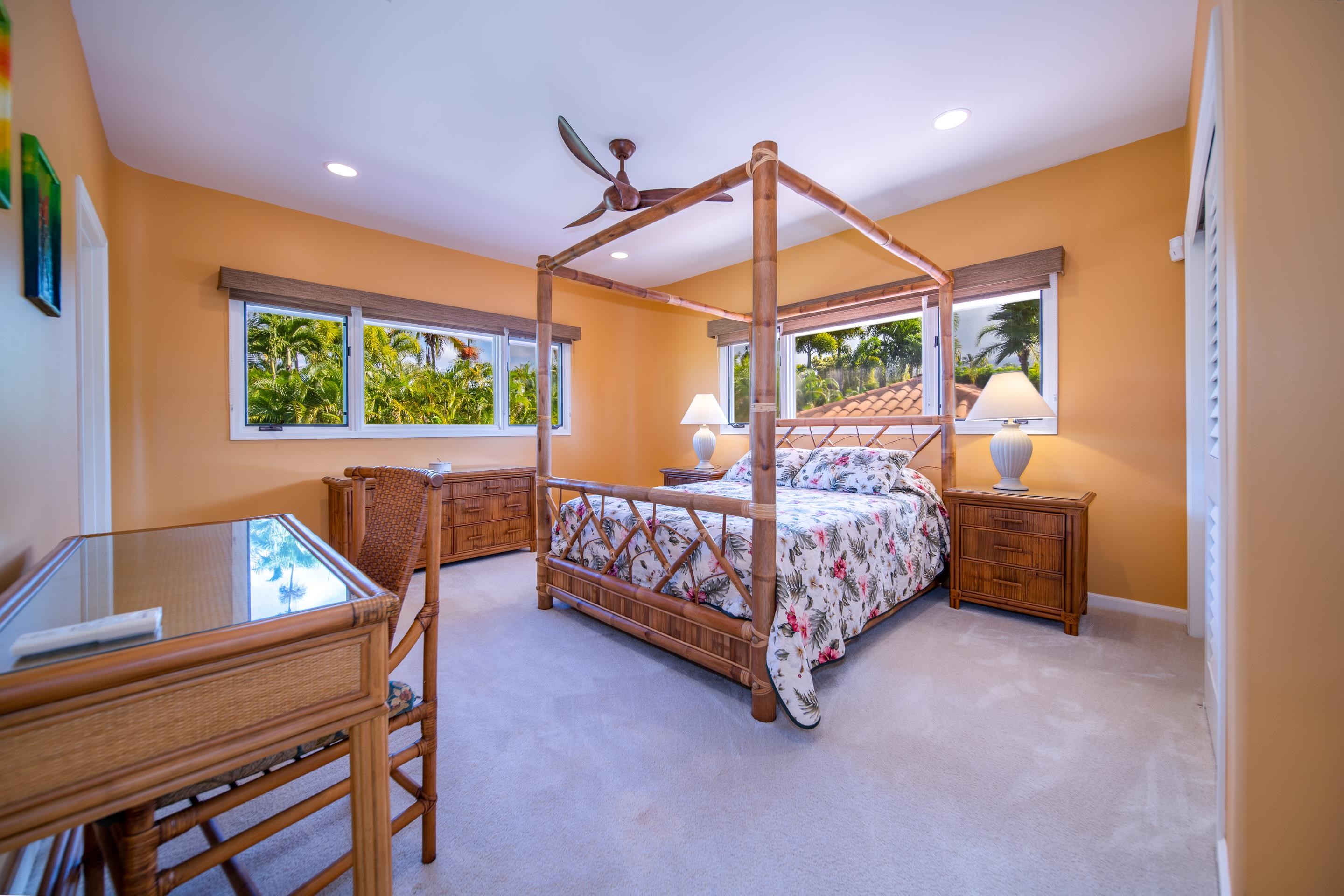 135 Kaimanu Place Kihei, HI 96753 - Photo 23 of 29 a bedroom with a bed and a window