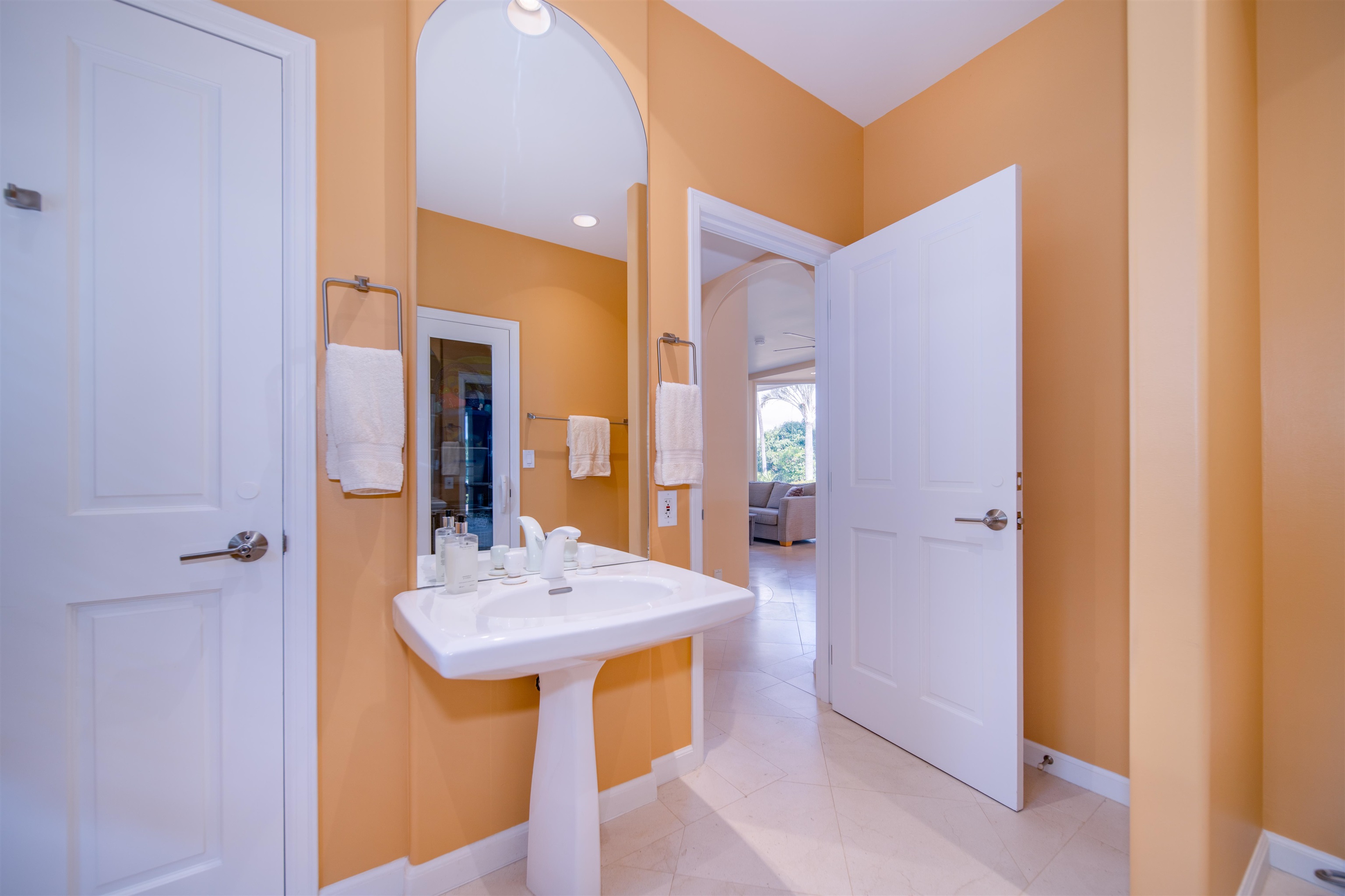 135 Kaimanu Place Kihei, HI 96753 - Photo 26 of 29 a bathroom with a sink and a mirror