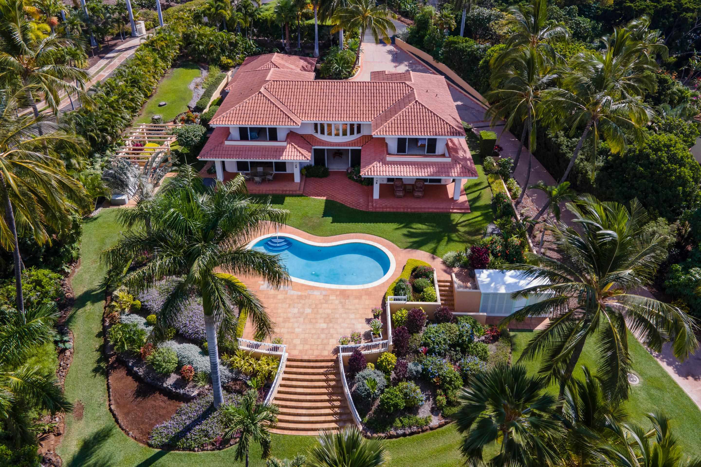 135 Kaimanu Place Kihei, HI 96753 - Photo 29 of 29 a aerial view of a house with swimming pool garden and patio