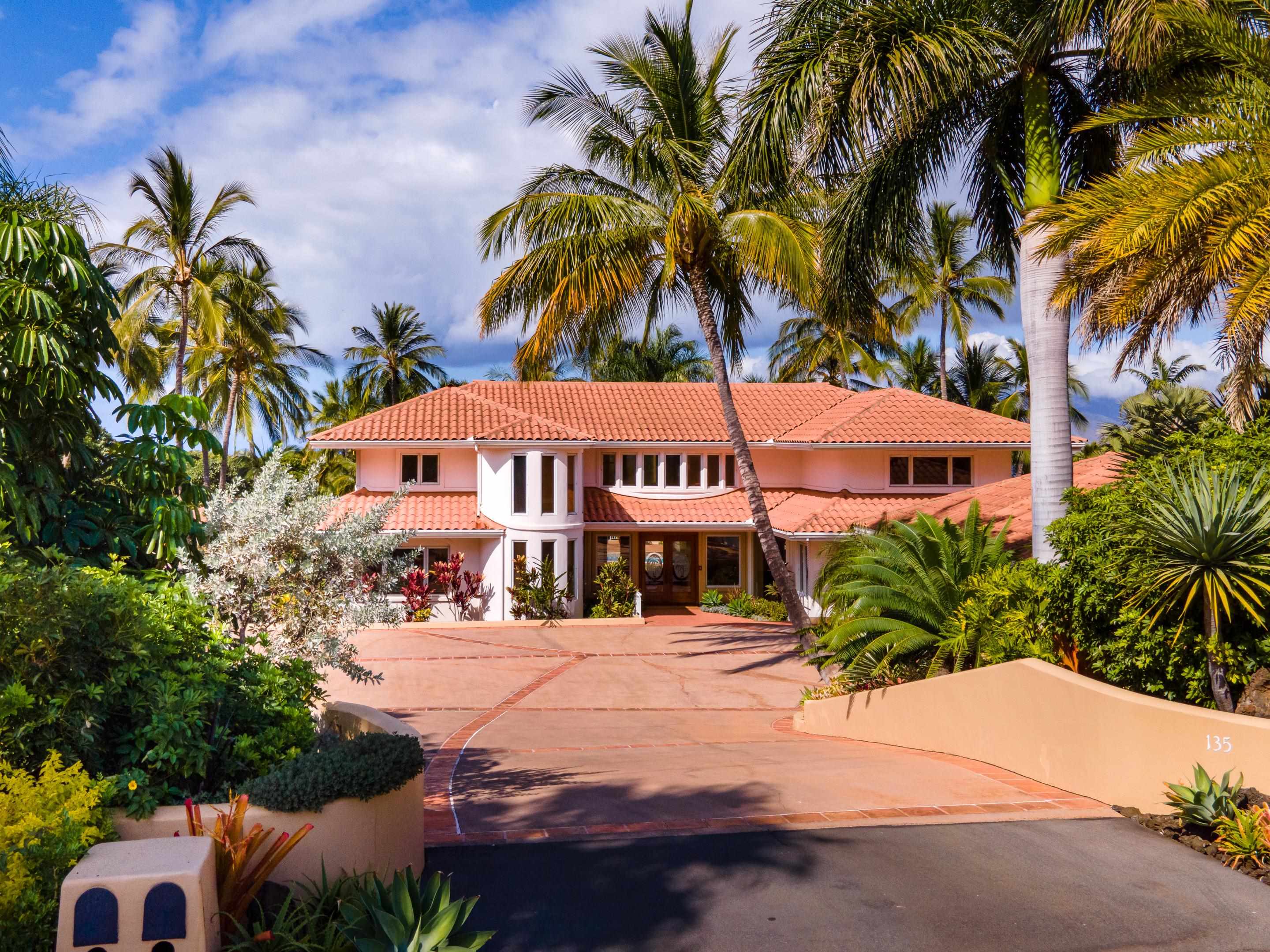 135 Kaimanu Place Kihei, HI 96753 - Photo 3 of 29 a view of multiple houses with a yard and potted plants