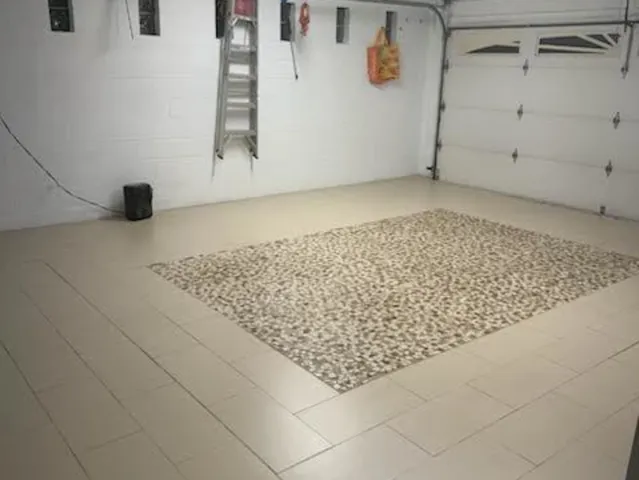 a front view of a building with a big yard