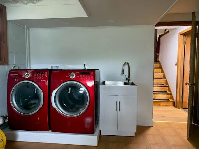 a utility room with dryer and washer