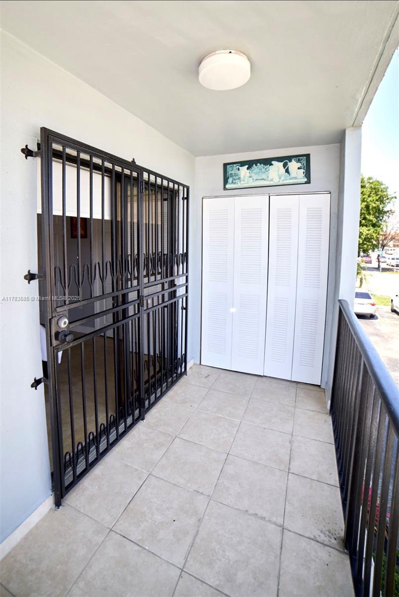 1380 West 41st Street, Unit 101 Hialeah, FL 33012 - Photo 23 of 23 a view of a hallway with entryway of a house