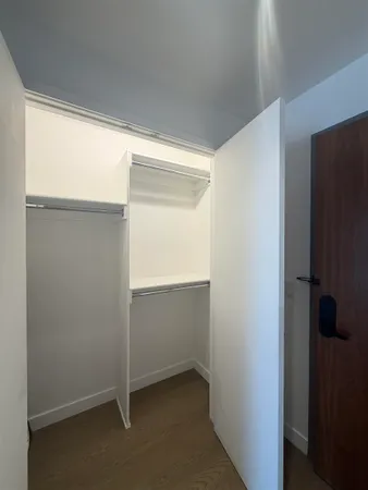 a picture of a bathroom with a sink and mirror