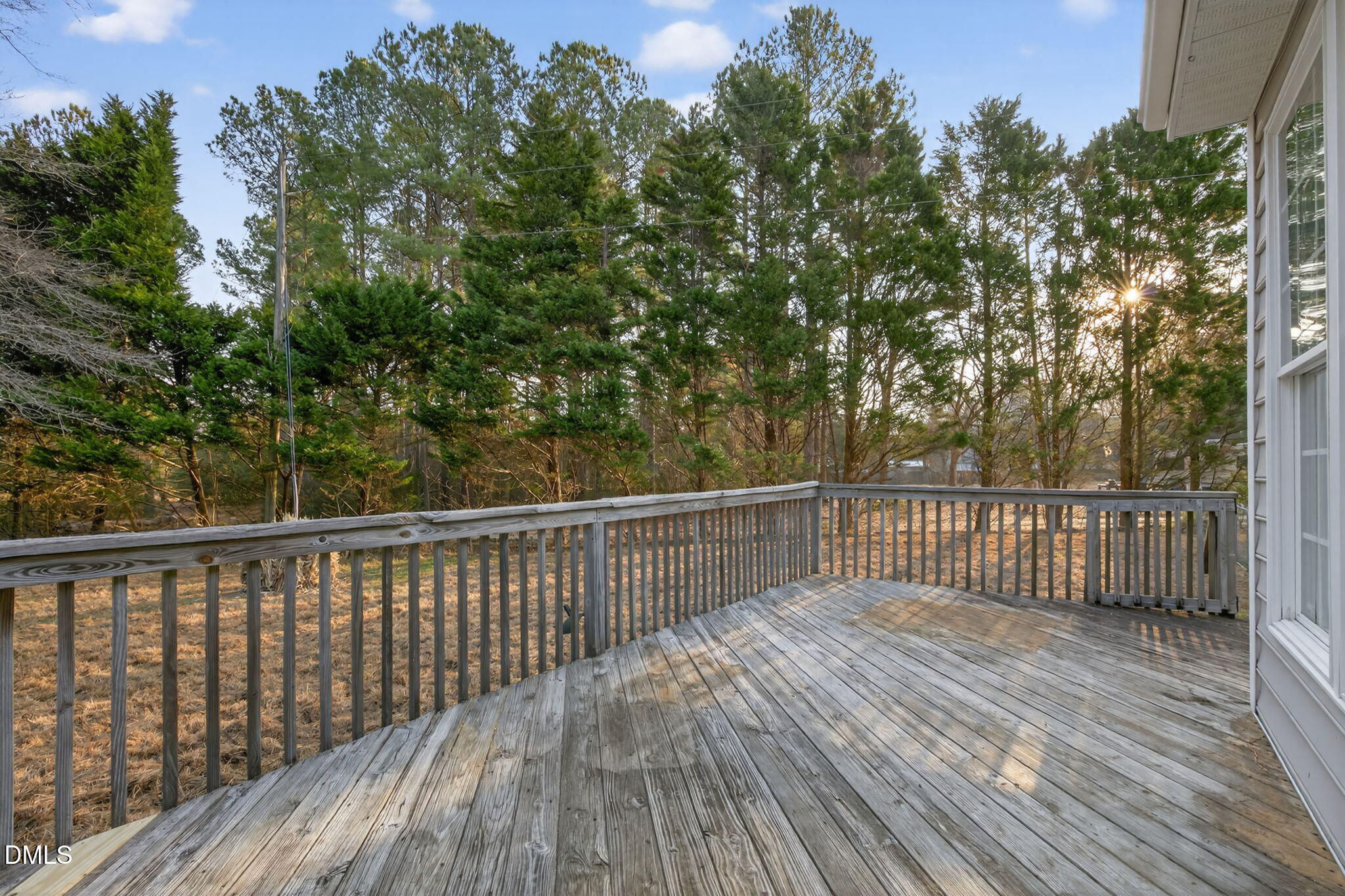 10000 Kennebec Road Willow Spring, NC 27592 - Photo 29 of 38 a view of deck with wooden floor and outdoor seating