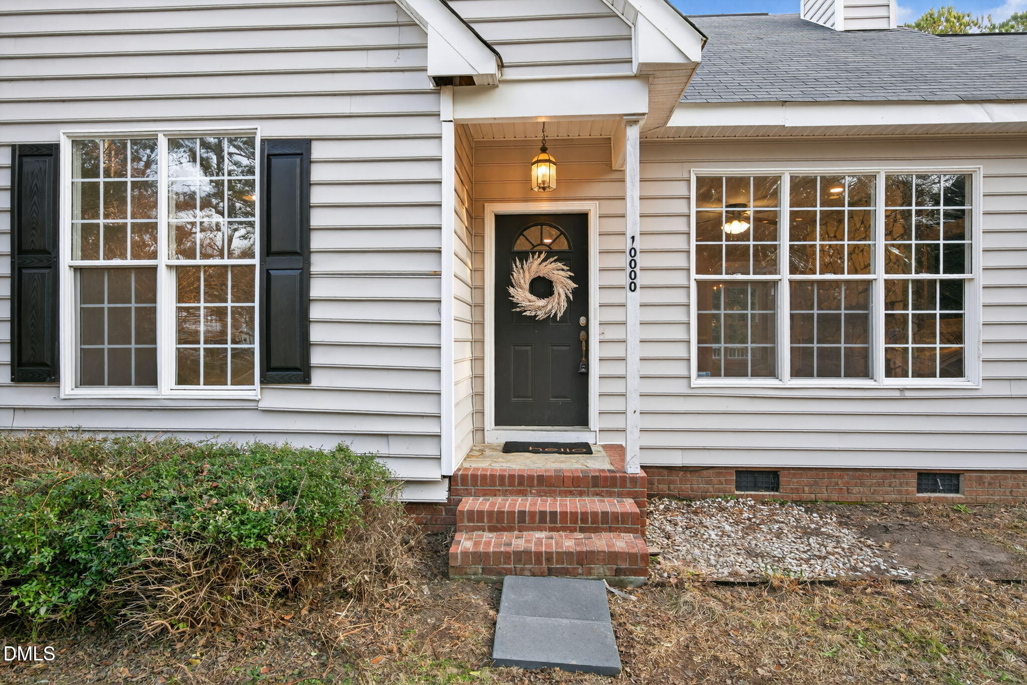 10000 Kennebec Road Willow Spring, NC 27592 - Photo 2 of 38 a front view of a house with a yard