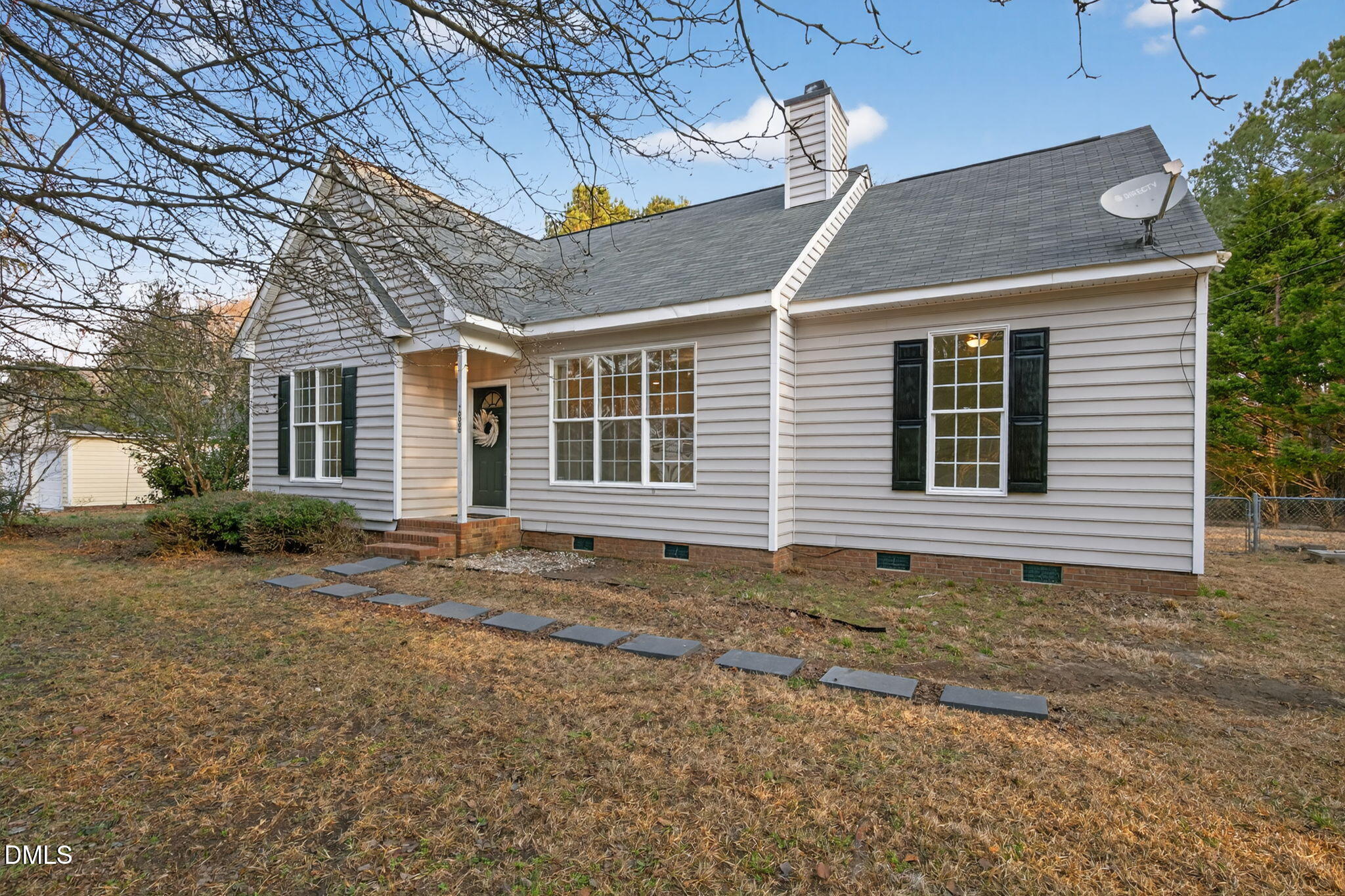 10000 Kennebec Road Willow Spring, NC 27592 - Photo 33 of 38 a house with trees in the background
