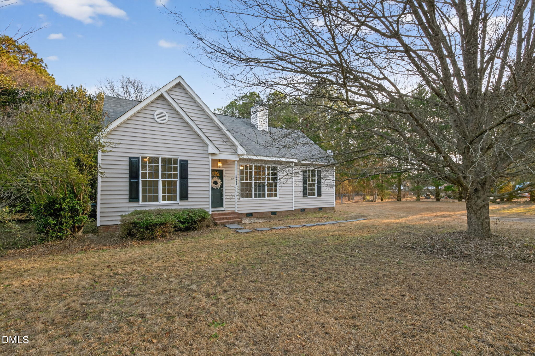 10000 Kennebec Road Willow Spring, NC 27592 - Photo 3 of 38 a view of a house with a yard