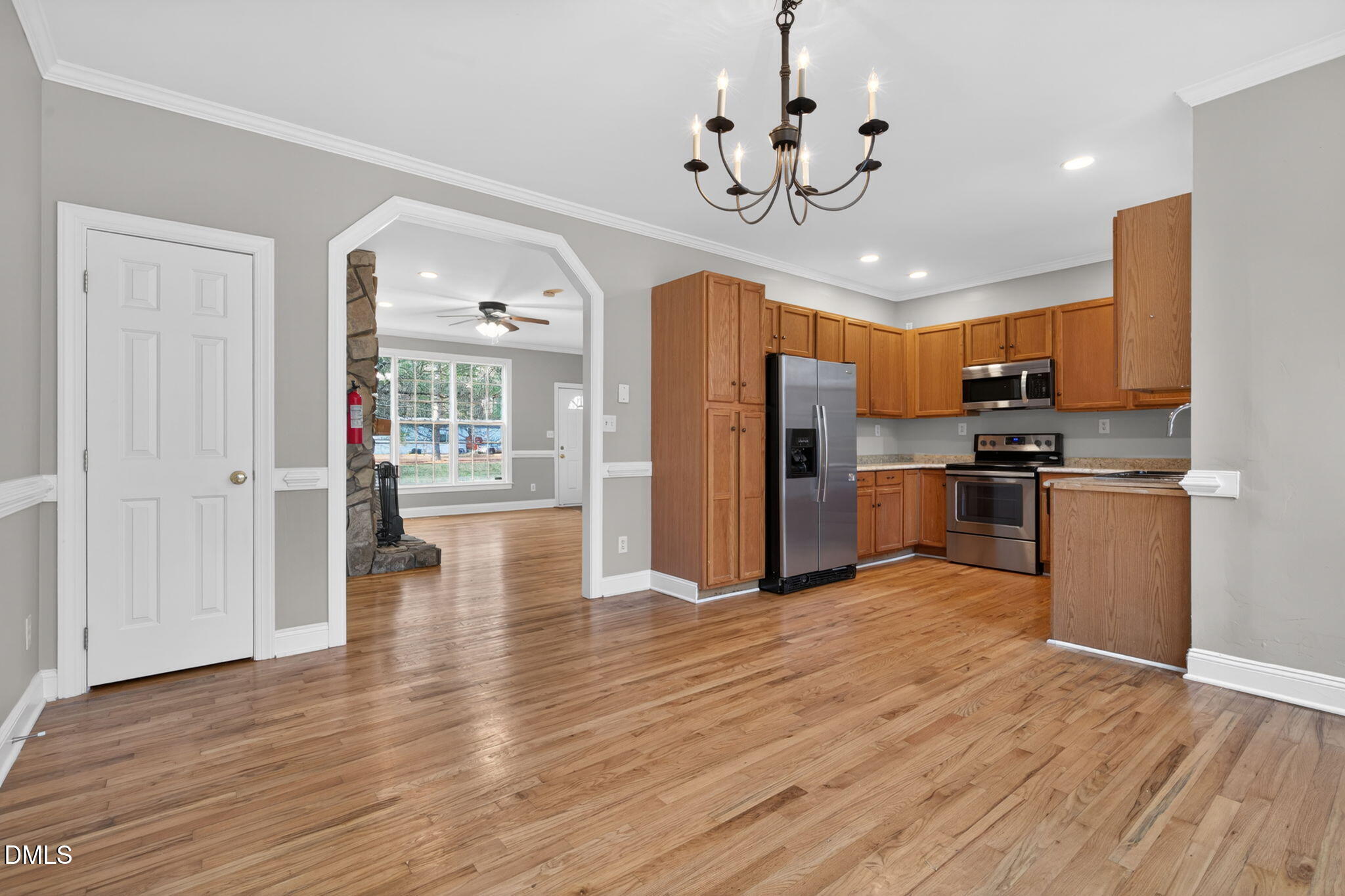 10000 Kennebec Road Willow Spring, NC 27592 - Photo 9 of 38 a view of kitchen with sink microwave and refrigerator