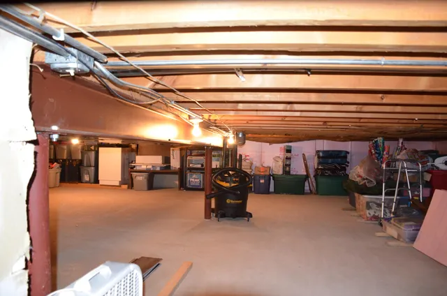 a front view of house with yard and outdoor seating