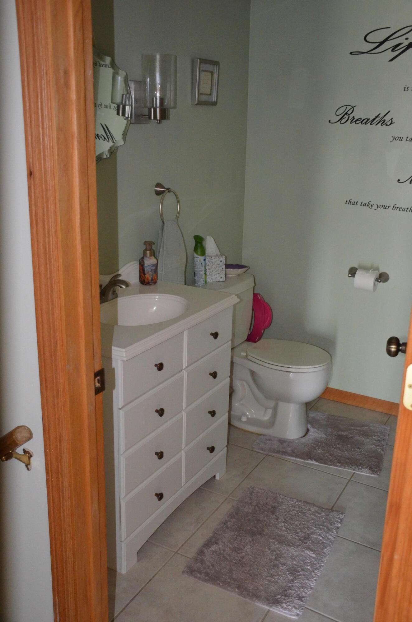 8262 Heron Lake Road St. John, IN 46373 - Photo 21 of 51 a bathroom with a sink toilet vanity and shower