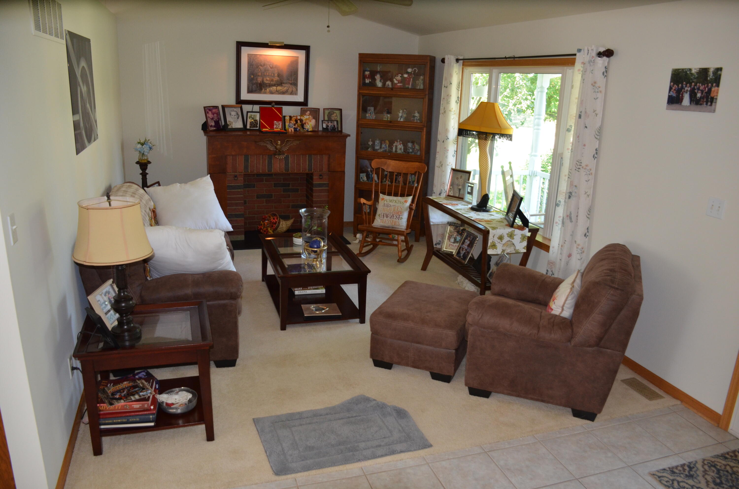 8262 Heron Lake Road St. John, IN 46373 - Photo 22 of 51 a living room with furniture and a flat screen tv