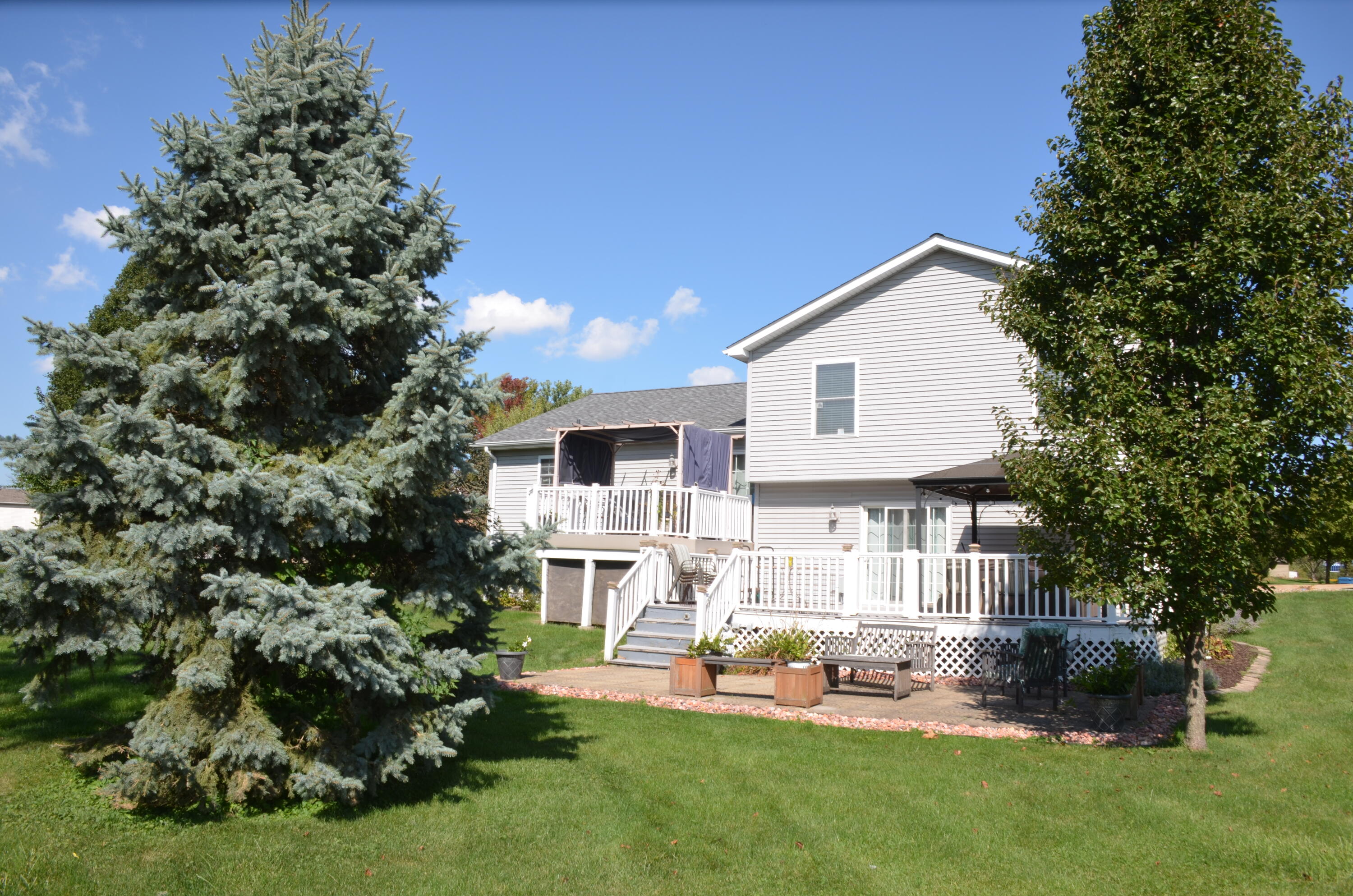 8262 Heron Lake Road St. John, IN 46373 - Photo 25 of 51 a front view of house with yard and outdoor seating