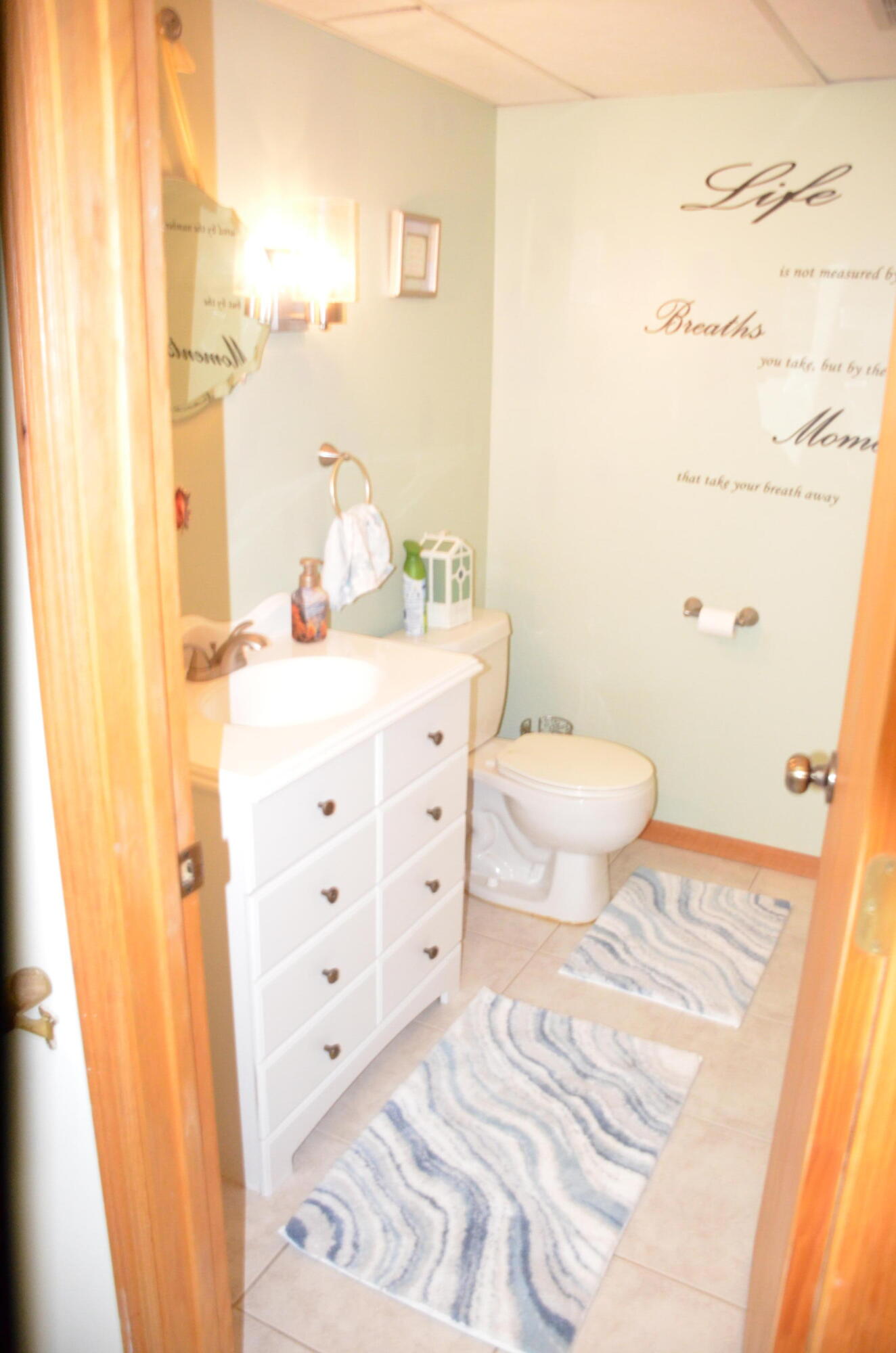 8262 Heron Lake Road St. John, IN 46373 - Photo 46 of 51 a bathroom with a sink a toilet and vanity