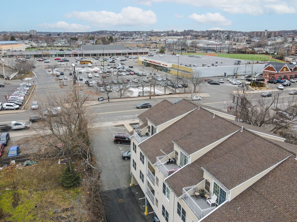39 Broadway, Unit 305 Malden, MA 02148 - Photo 32 of 36 an aerial view of a building with beach