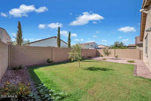 a house view with a garden space