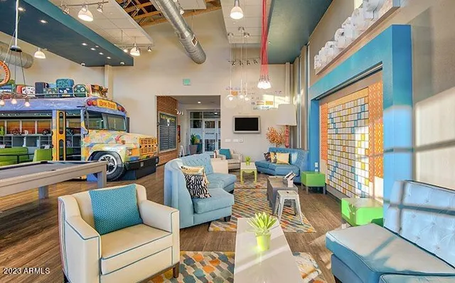 a view of backyard of house with seating space