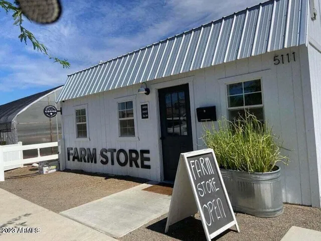 a view of a park with swings and slides