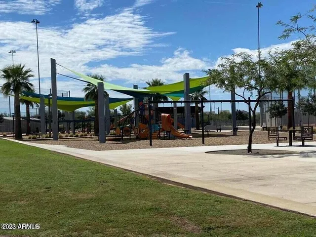 a lake view with boat and trees in the background
