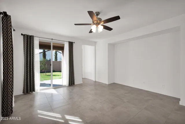 a view of an empty room and window