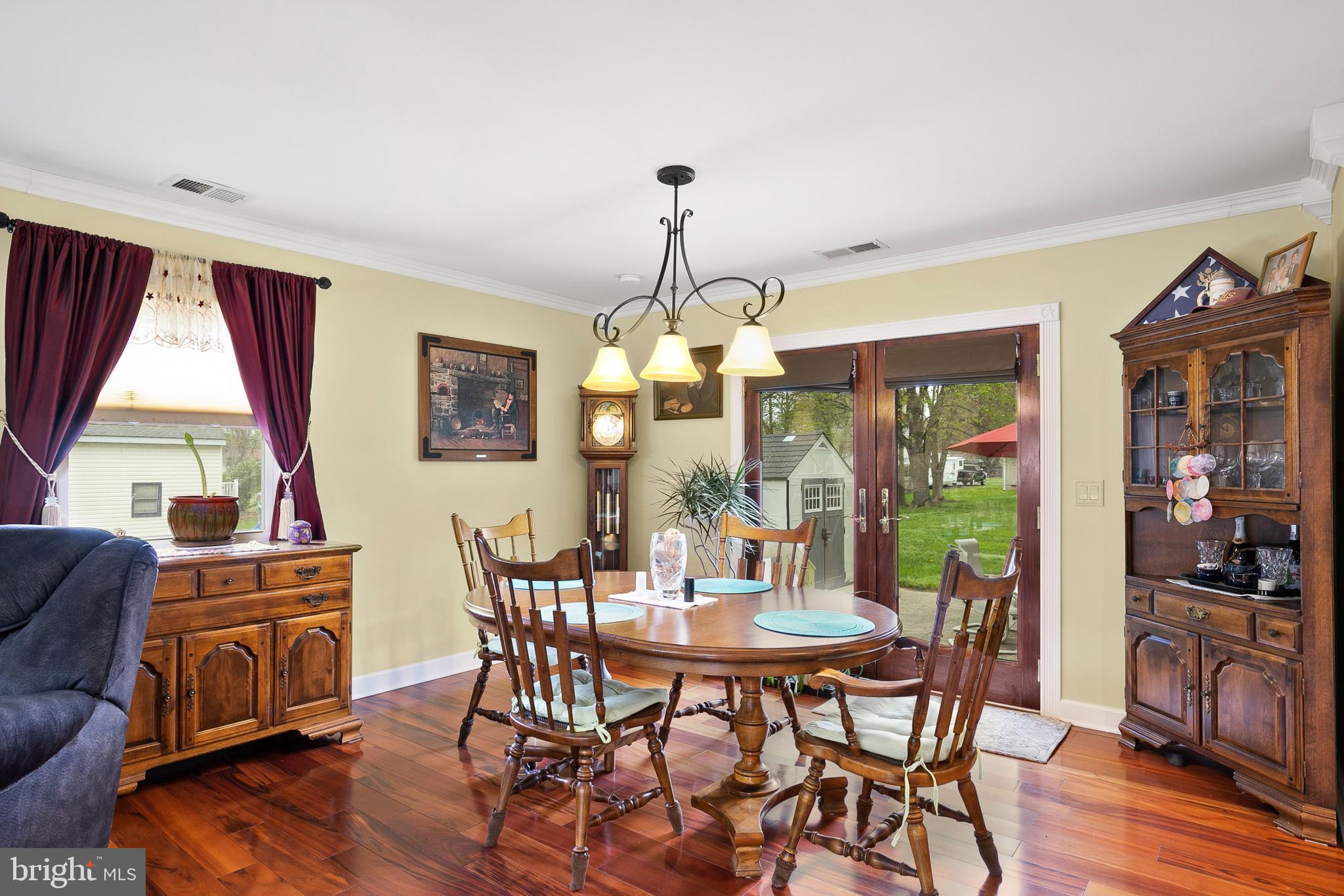 214 Utah Road Stevensville, MD 21666 - Photo 8 of 38 Dining Area Opens to the Back Patio