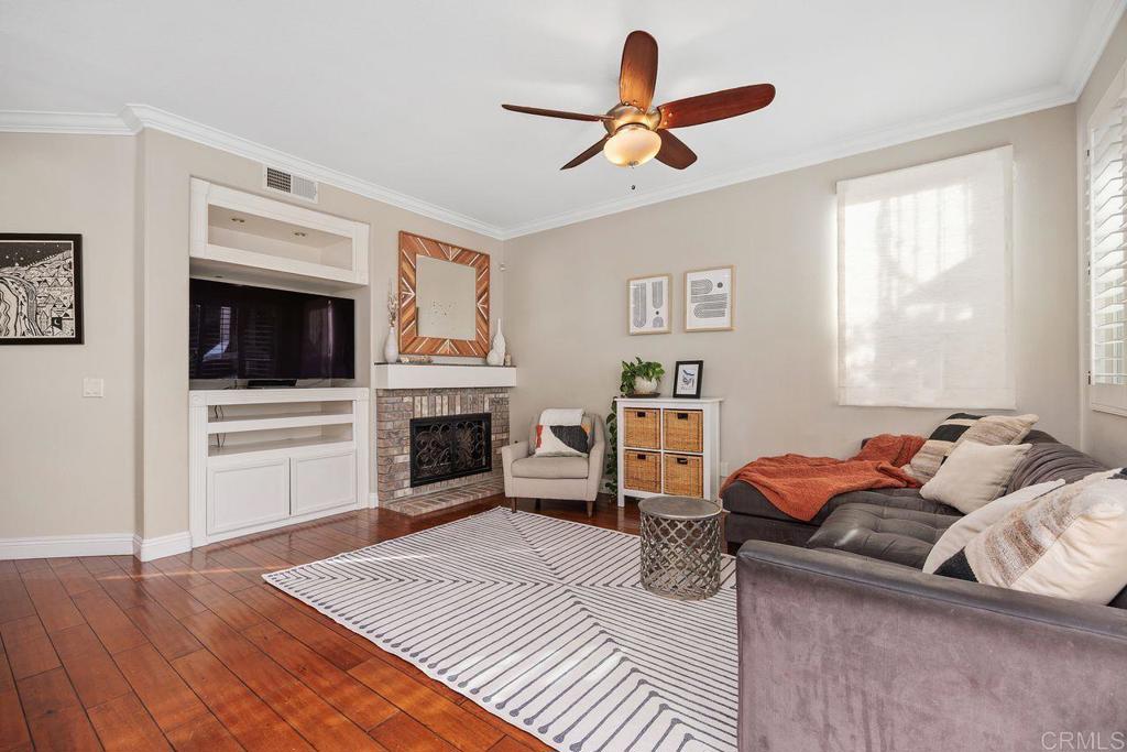 6707 Blue Point Drive Carlsbad, CA 92011 - Photo 20 of 43 a bedroom with furniture and a fireplace