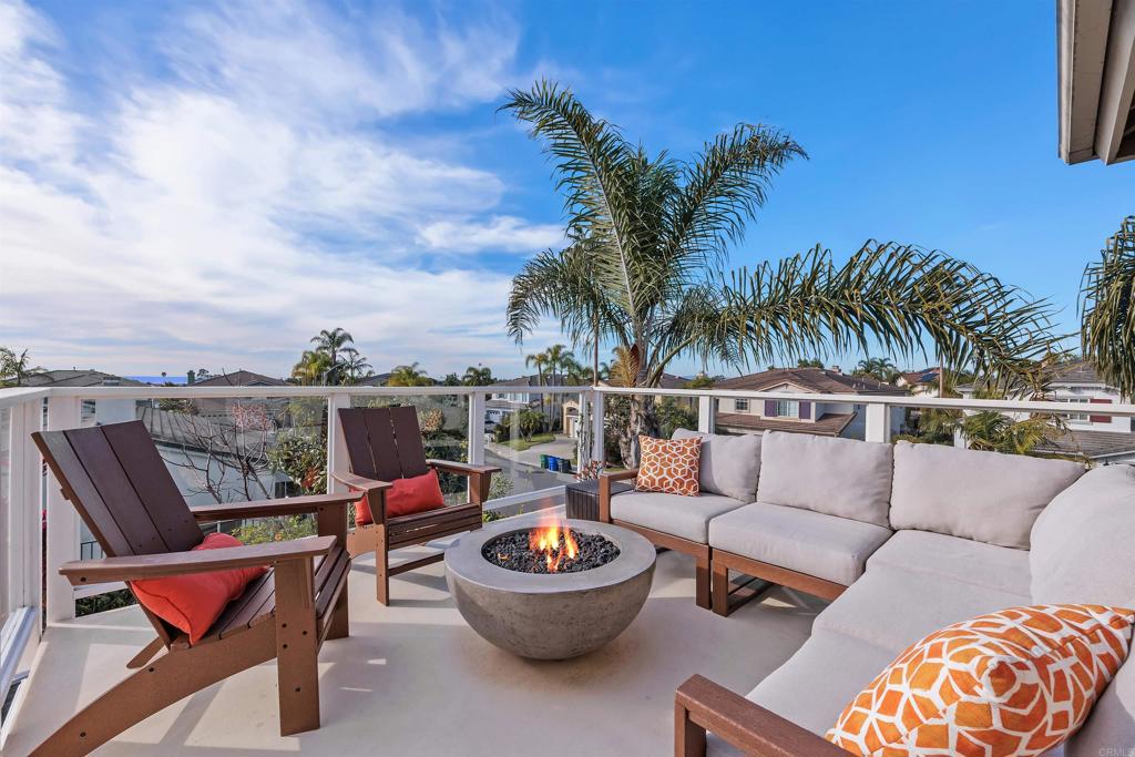 6707 Blue Point Drive Carlsbad, CA 92011 - Photo 28 of 43 a outdoor living space with furniture and city view