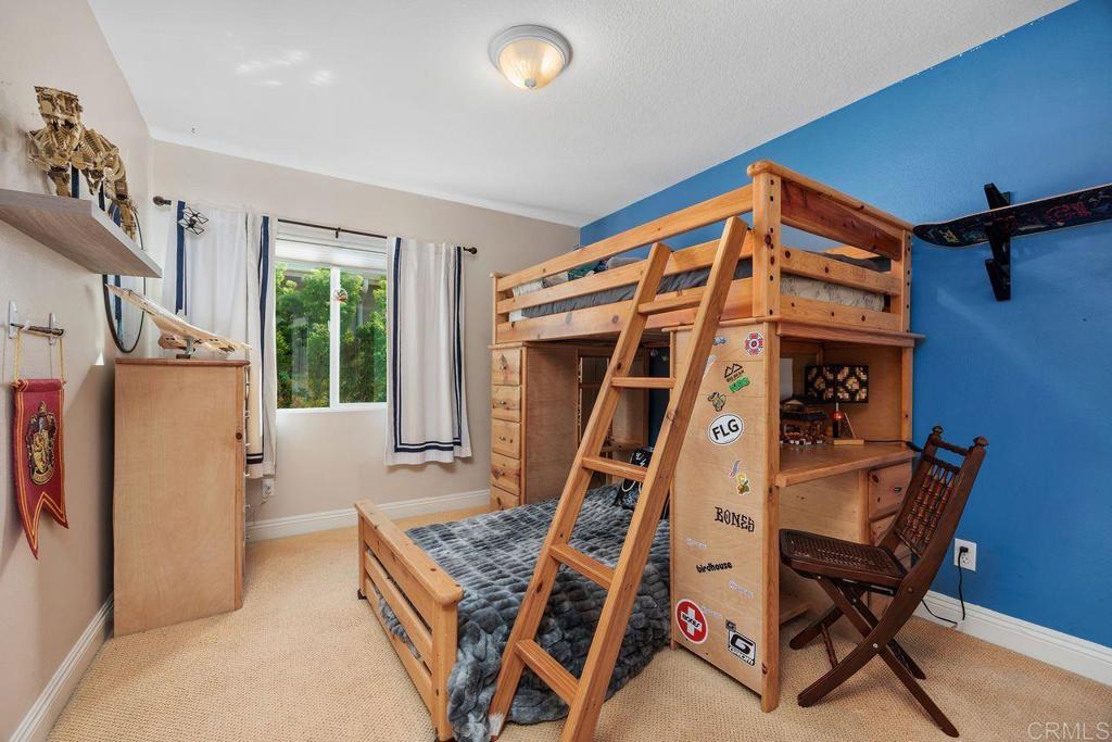 6707 Blue Point Drive Carlsbad, CA 92011 - Photo 36 of 43 a bed room with a bed and a chair