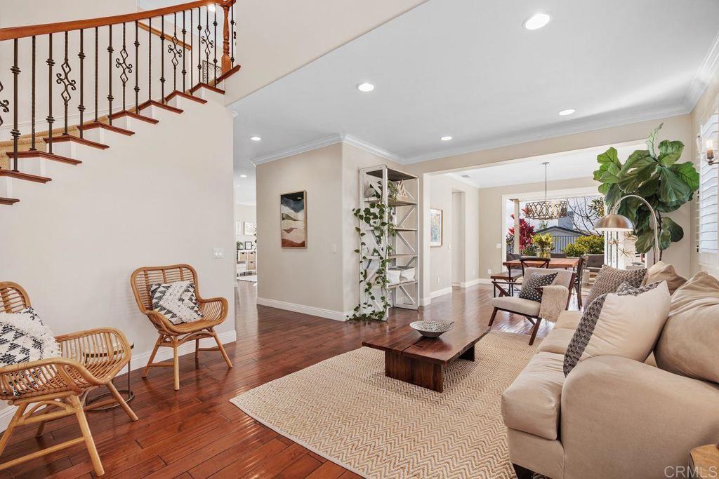 6707 Blue Point Drive Carlsbad, CA 92011 - Photo 4 of 43 a living room with furniture and wooden floor