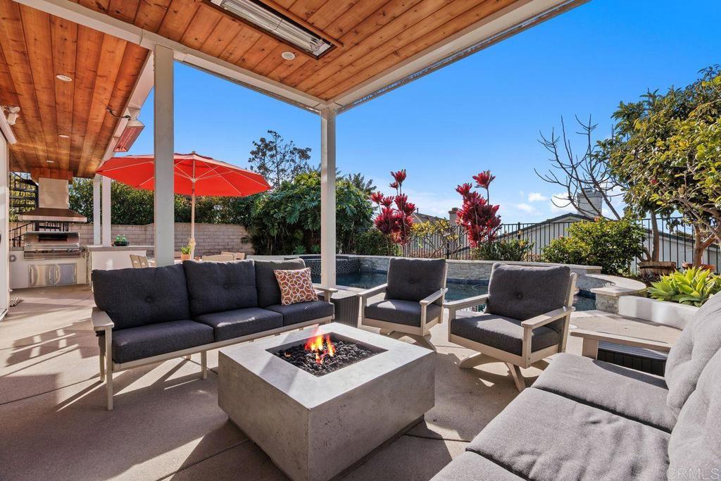6707 Blue Point Drive Carlsbad, CA 92011 - Photo 7 of 43 a view of a tables and chairs in patio