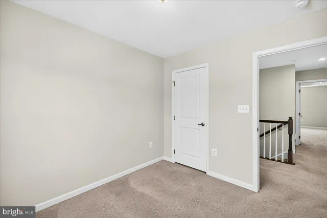 a view of a room with a hallway