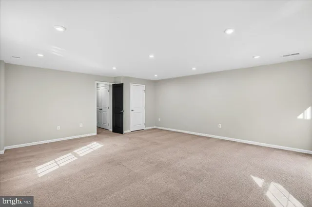 an empty room with an entryway
