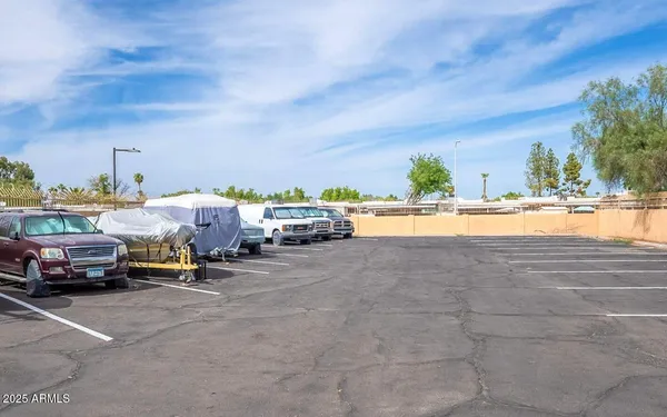 a view of a patio with two chairs and a table