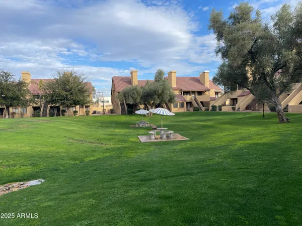 a house view with a lake view