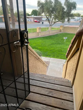 a living room with a fireplace and a flat screen tv