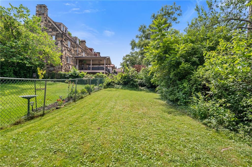 1241 Cochran Road Pittsburgh, PA 15243 - Photo 21 of 30 a view of a yard with a house