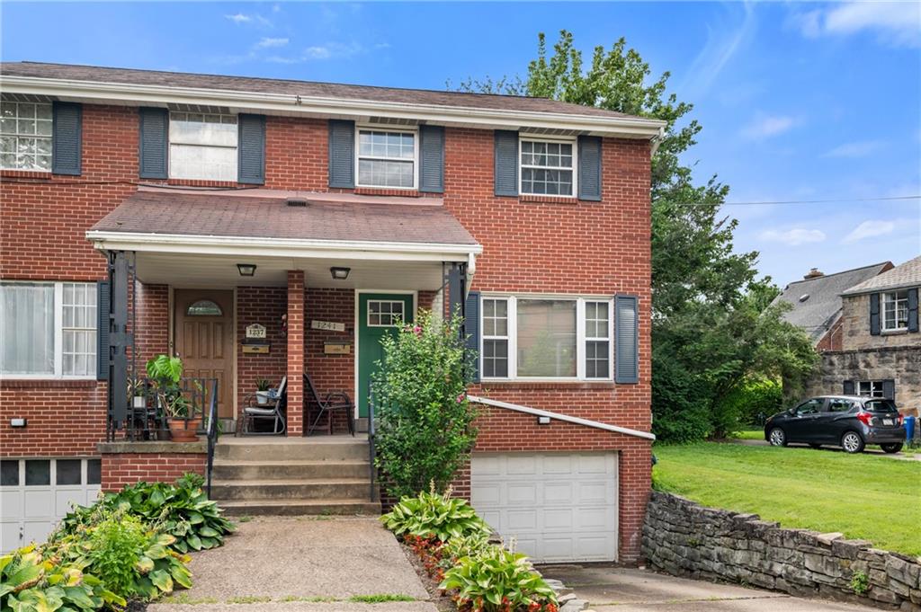 1241 Cochran Road Pittsburgh, PA 15243 - Photo 27 of 30 a view of a house with a yard