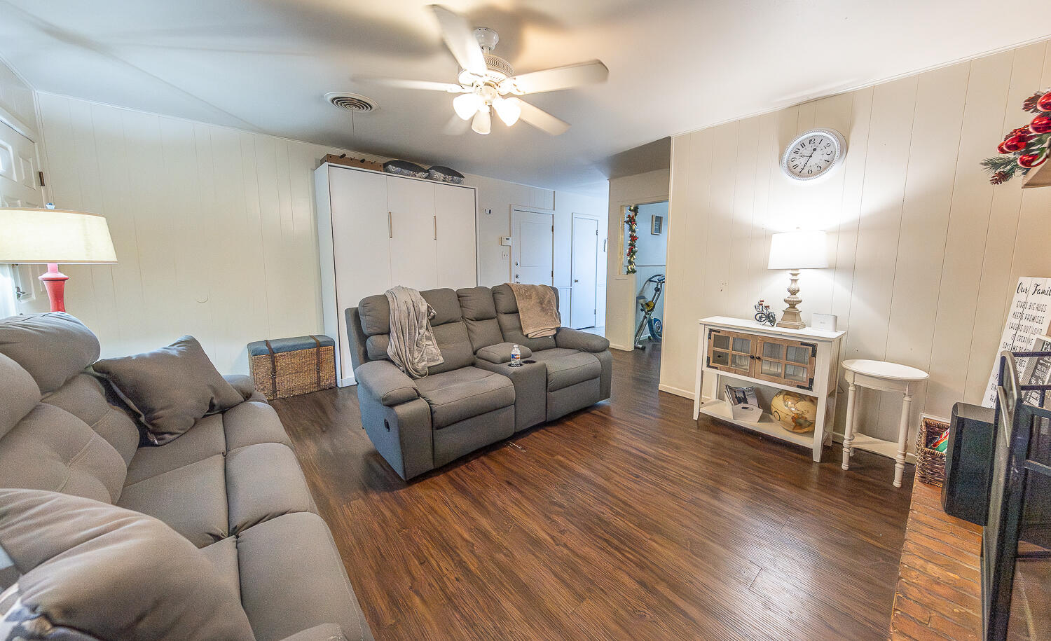2412 33rd Street Lubbock, TX 79411 - Photo 6 of 34 a living room with furniture and a wooden floor