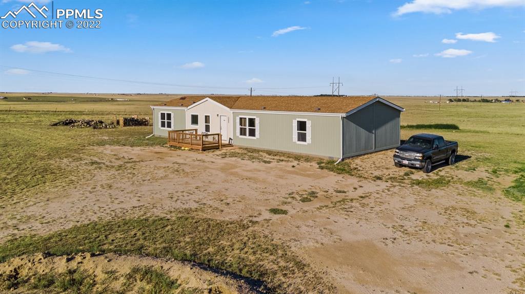 1305 North Ramah Highway Yoder, CO 80864 - Photo 2 of 30 a view of an ocean with a big yard