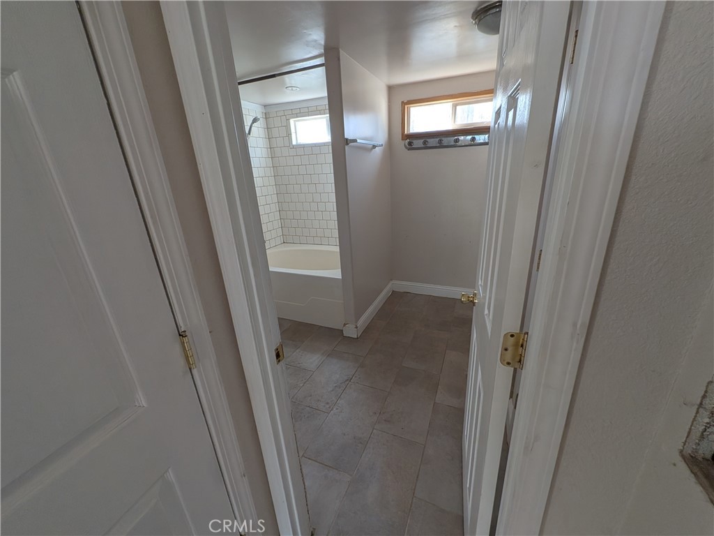 6029 1st Avenue Lucerne, CA 95458 - Photo 23 of 34 a view of an empty room and a mirror