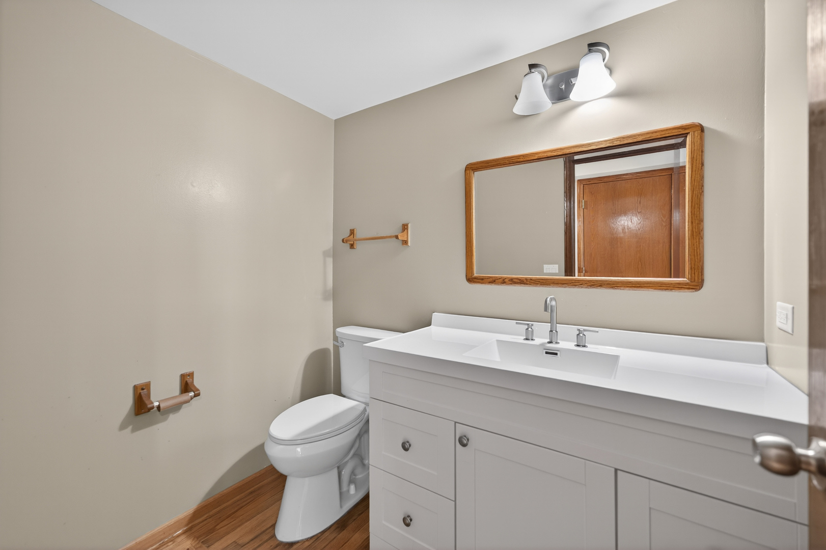 1281 Scarlet Drive Addison, IL 60101 - Photo 18 of 38 a bathroom with a toilet a sink and mirror
