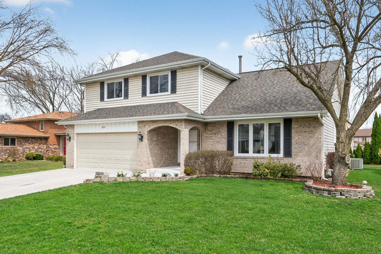 1281 Scarlet Drive Addison, IL 60101 - Photo 2 of 38 a front view of house with yard and green space