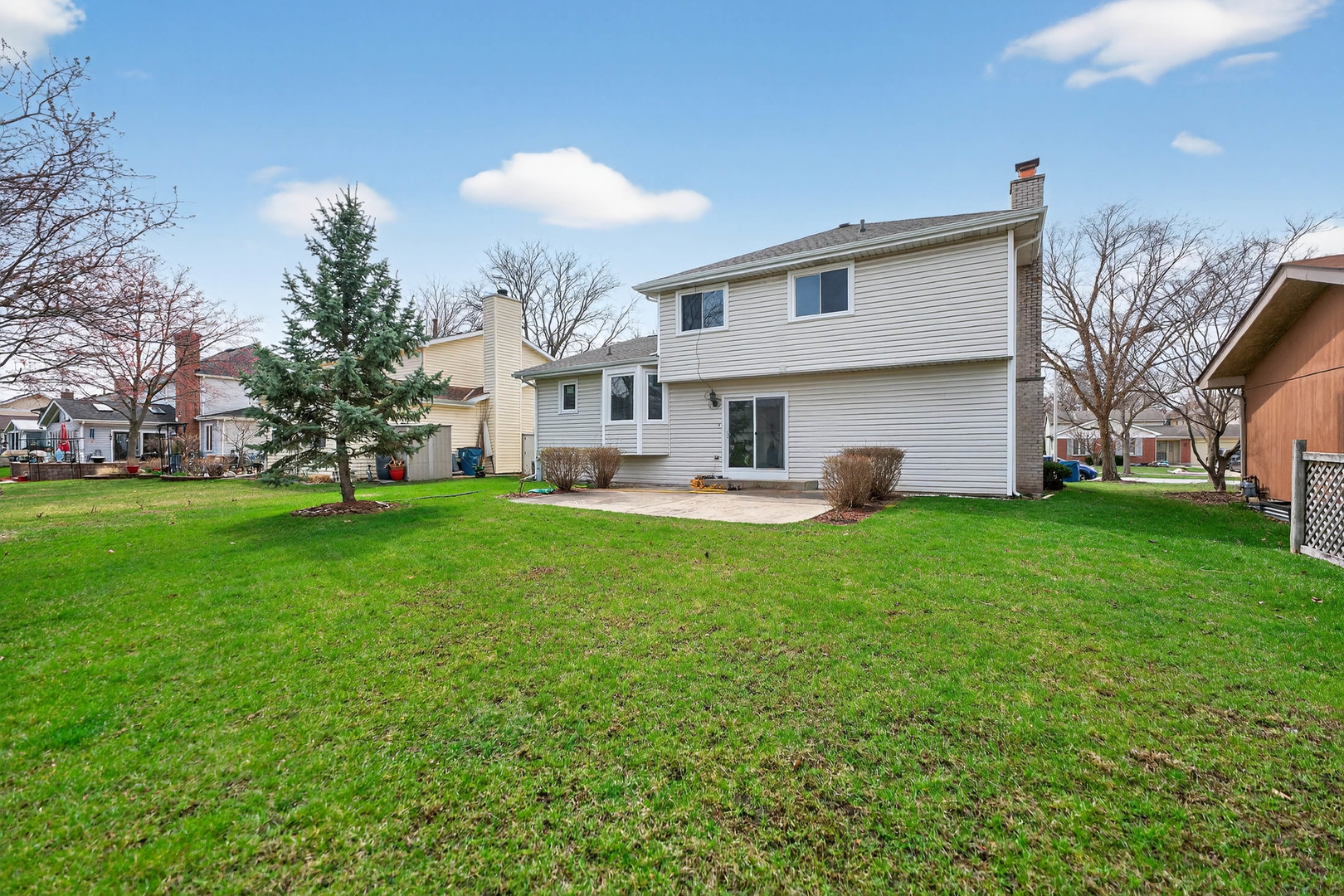1281 Scarlet Drive Addison, IL 60101 - Photo 38 of 38 a front view of a house with garden