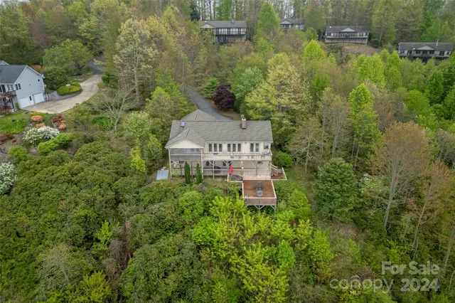 an aerial view of a house with a garden