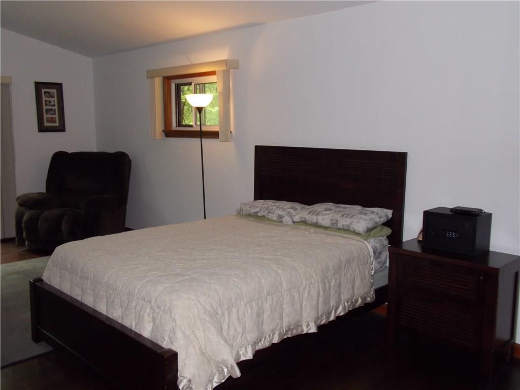 579 Laurel Summit Road Boswell, PA 15531 - Photo 13 of 25 Master bedroom with sliding glass door to deck with large walk in closet,