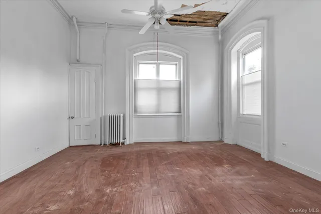 a kitchen with stainless steel appliances a stove top oven a sink and a refrigerator