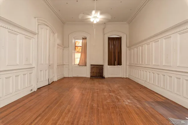 a open kitchen with stainless steel appliances granite countertop a stove top oven a sink and a refrigerator