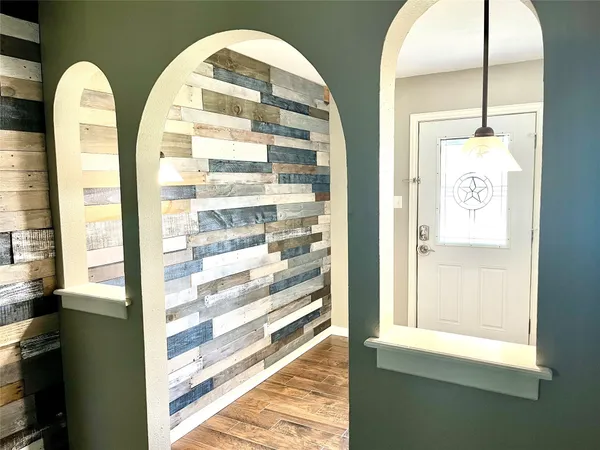 a view of living room with a large window